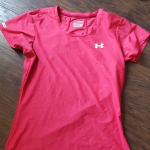 Pink under Armour shirt.